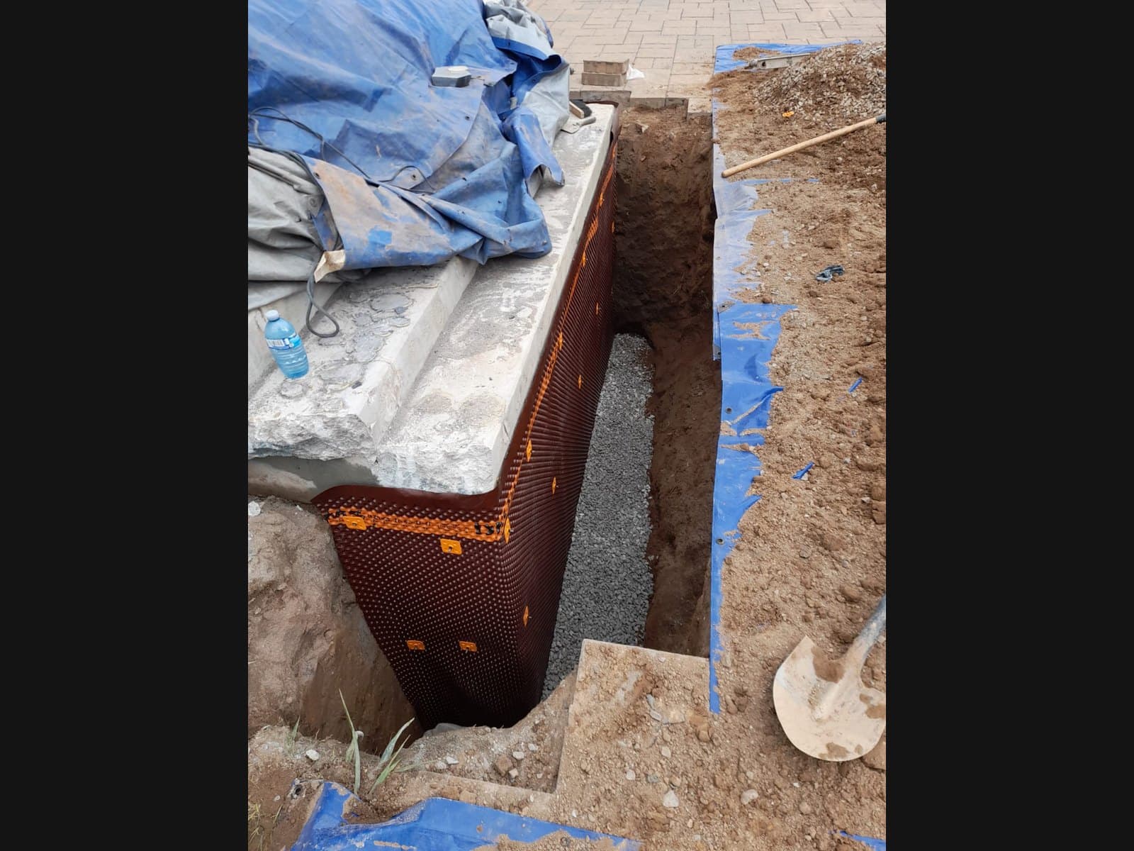 Interior dimpled membrane installation by Basement Waterproofing Muskoka