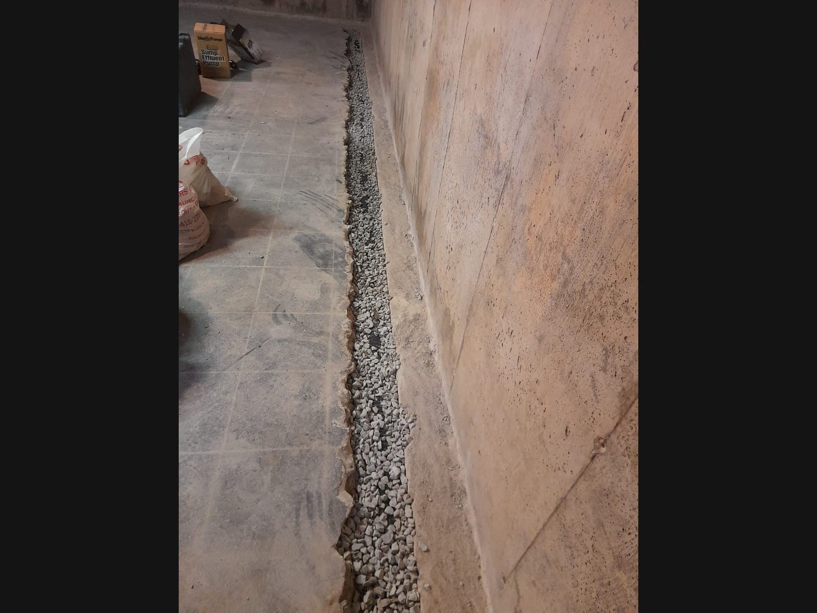 Sump area during interior waterproofing in Muskoka